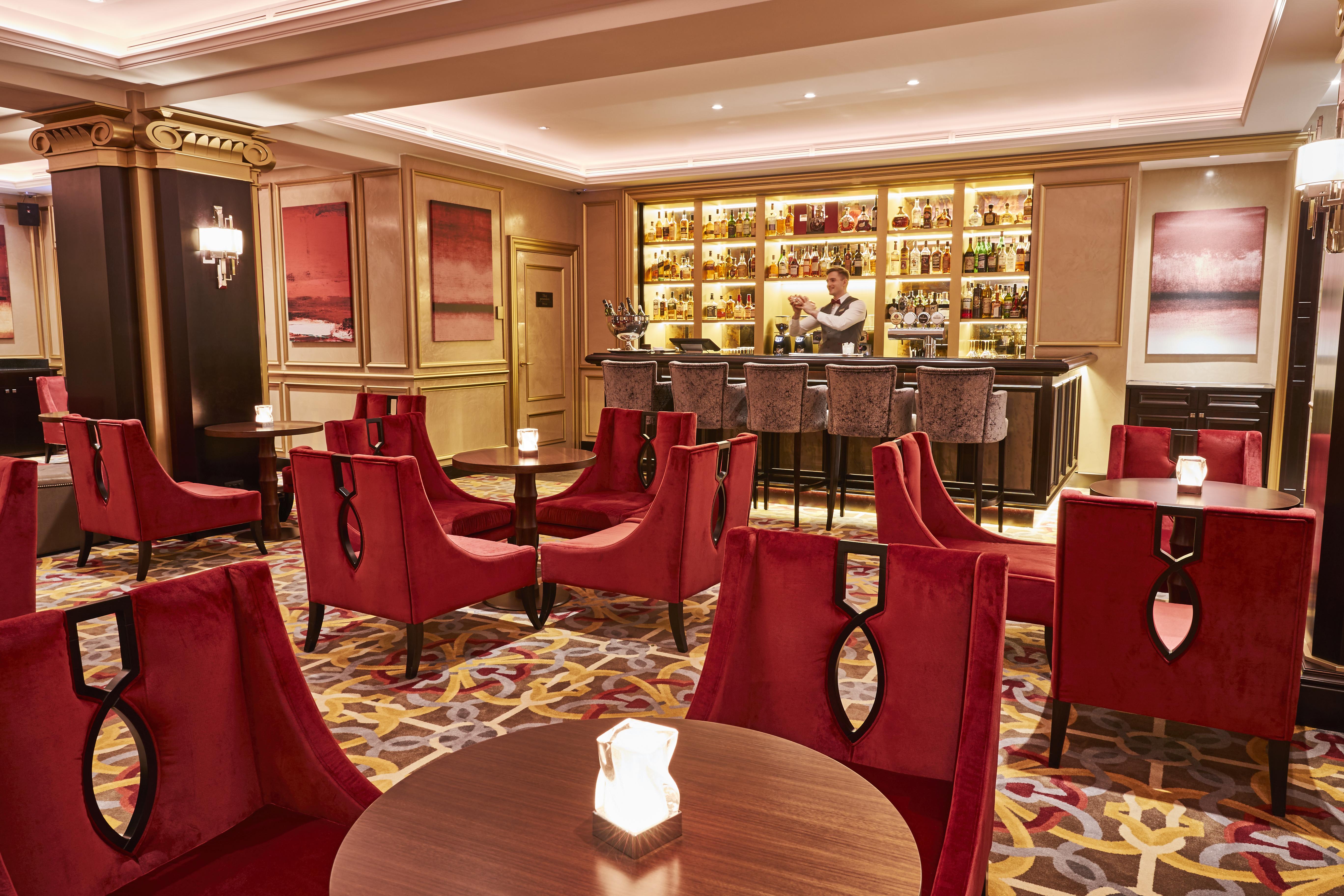 Grand Hotel Kempinski Riga Bagian luar foto The bar at the 1901 Lounge