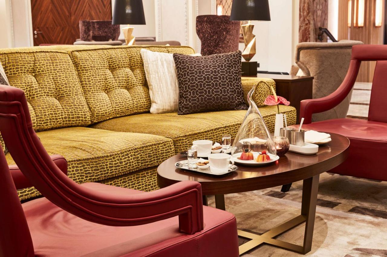 Grand Hotel Kempinski Riga Bagian luar foto The interior of the hotel